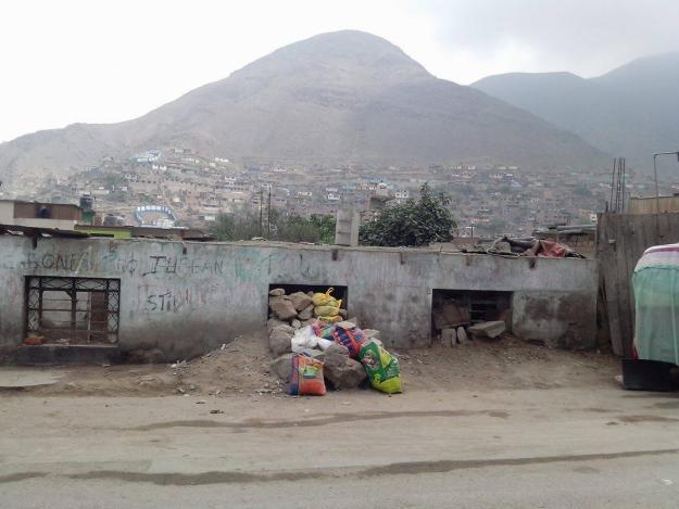 VENDO TERRENO OCUPADO INVADIDO EN COMAS