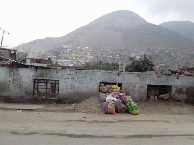 VENDO TERRENO OCUPADO INVADIDO EN COMAS