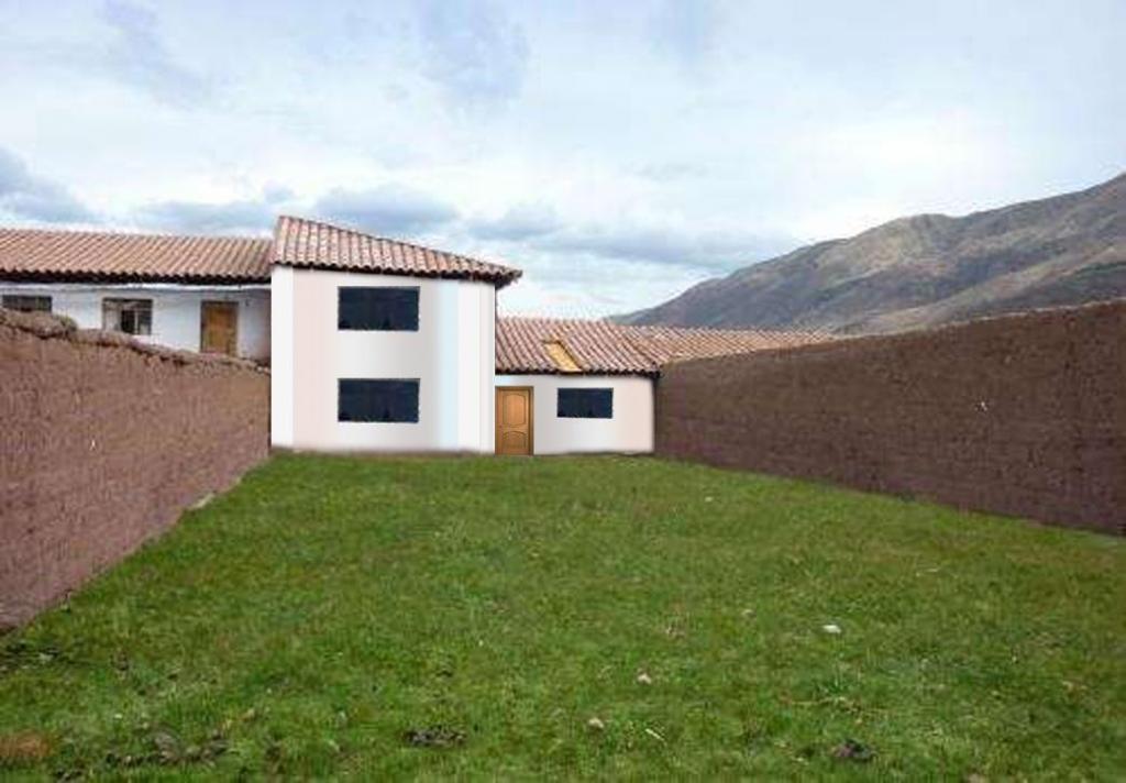 Vendo Terreno con Casa en  Huasao